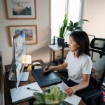 Female graphic designer working from home office