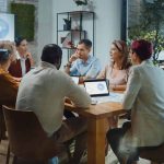 Group of people meeting around a table